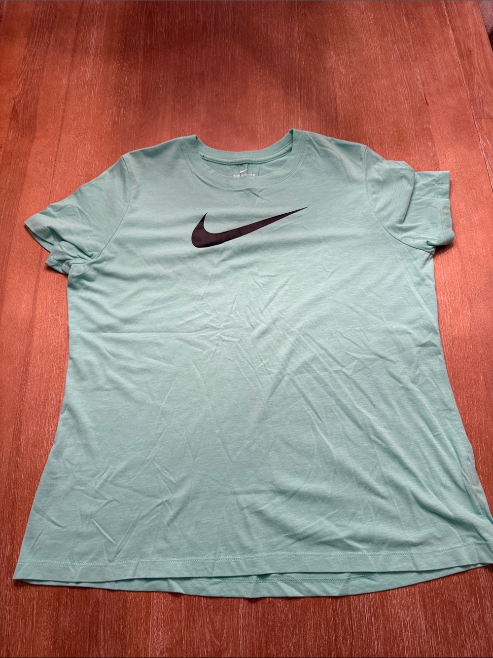 Nike Women's Light Teal Short Sleeve Tee with Black Swoosh